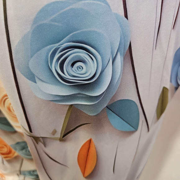 Elegant Floral Sleeveless Jumpsuit - Picture 2 of 9